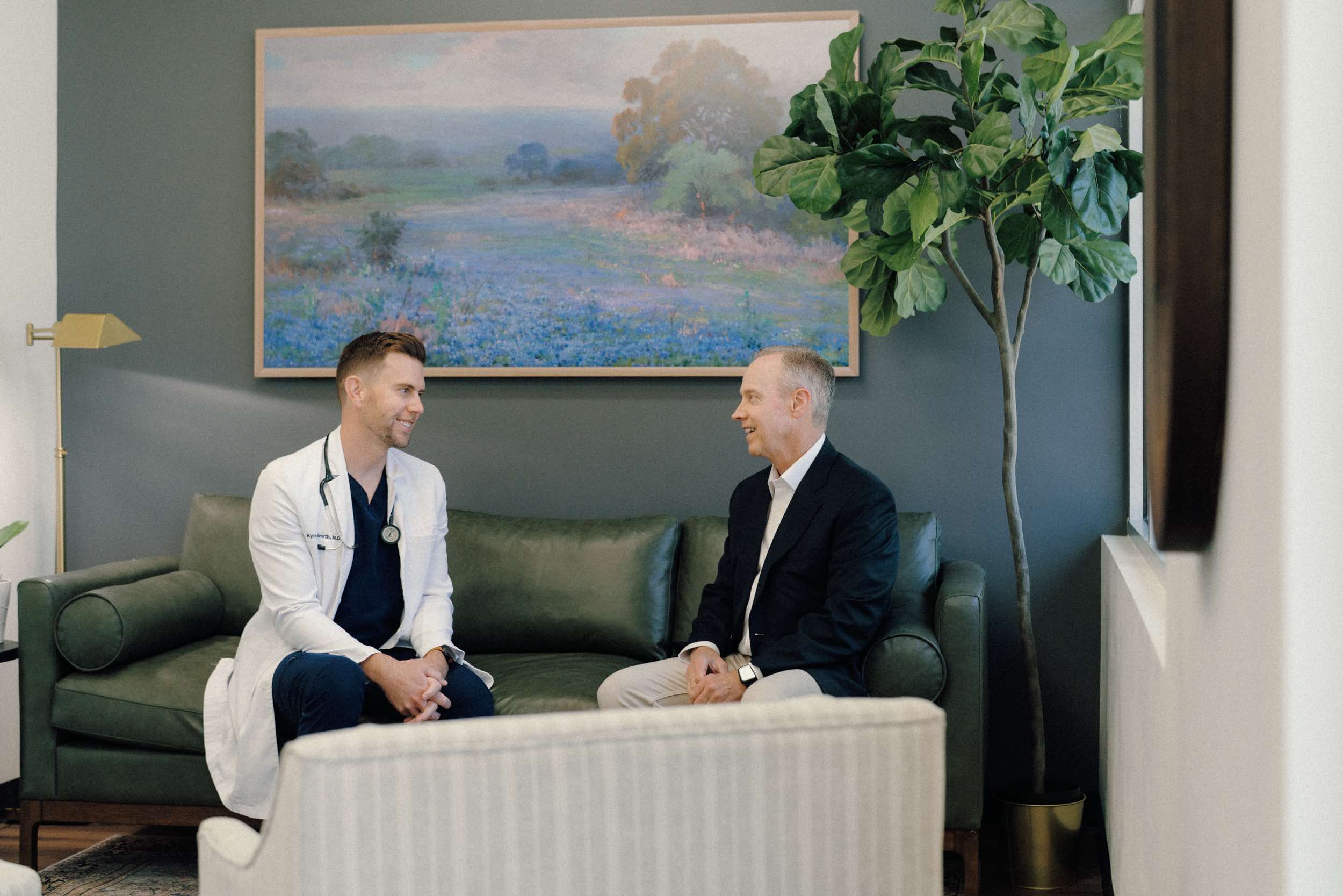Dr. Kyle Smith in a relaxed conversation with a patient